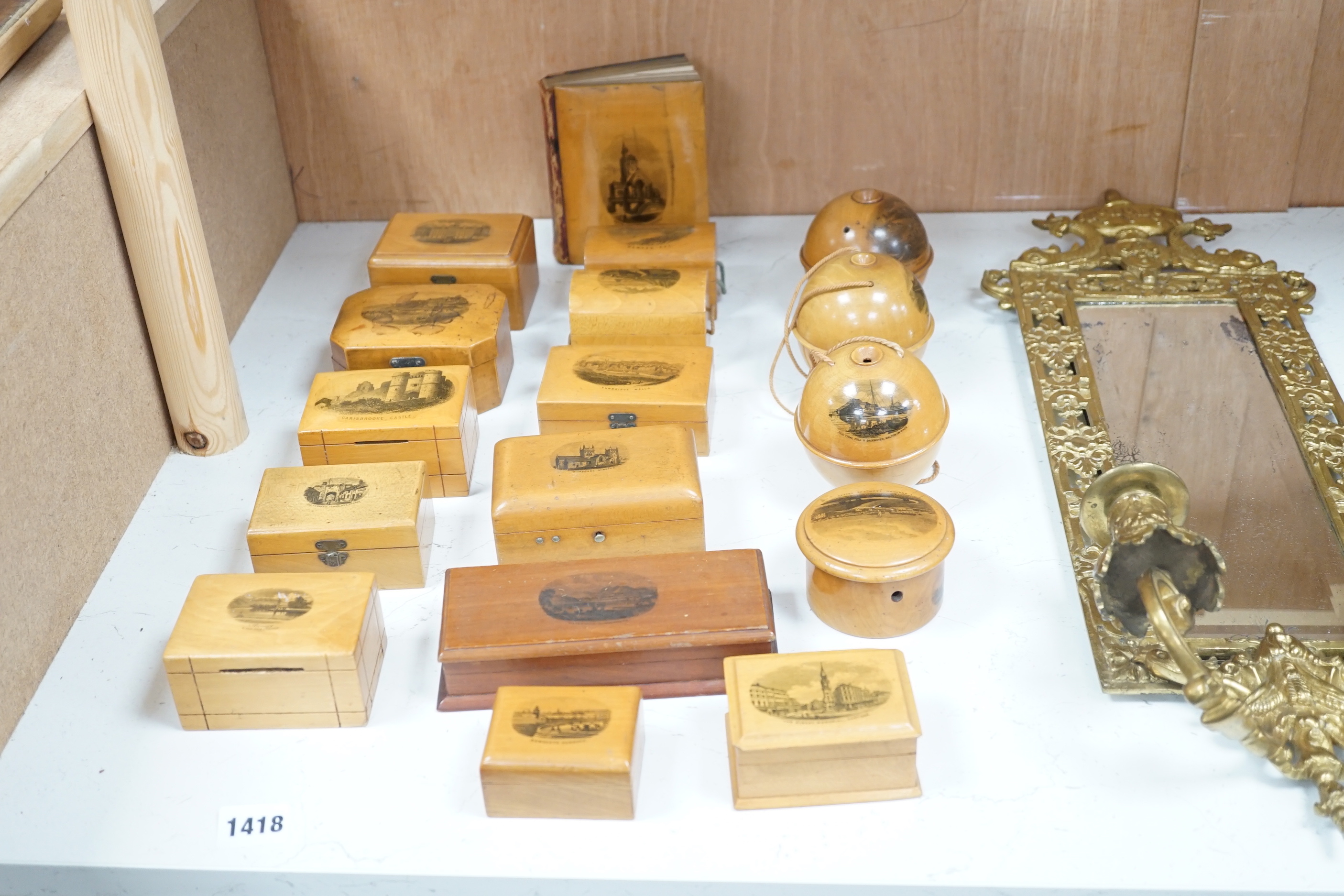 A collection of mixed Mauchline wares, including boxes and a book cover